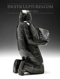 9" Carver Carrying Soapstone by Pits Qimirpik